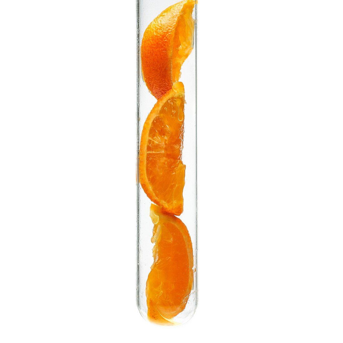 Orange slices in a test tube