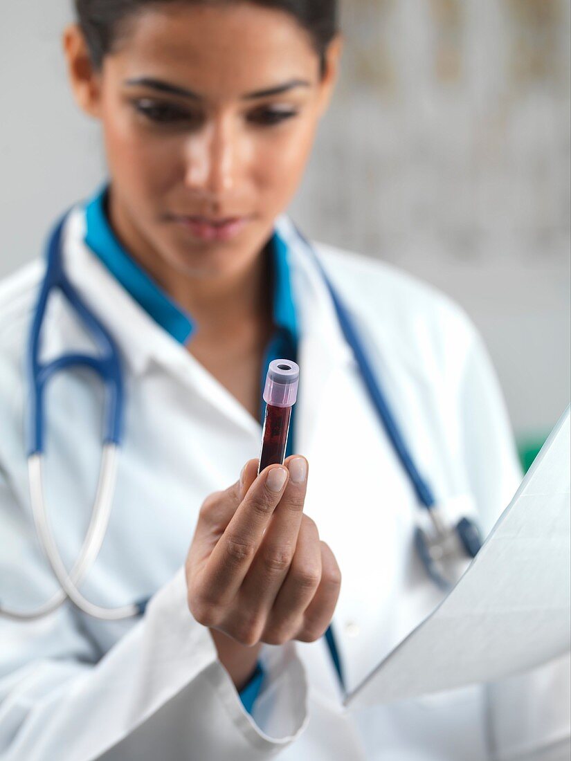 Doctor holding a blood sample