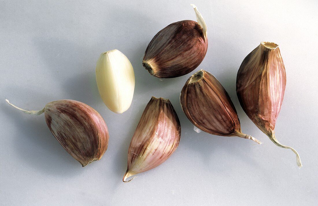 Several Cloves of Garlic; Peeled and Unpeeled