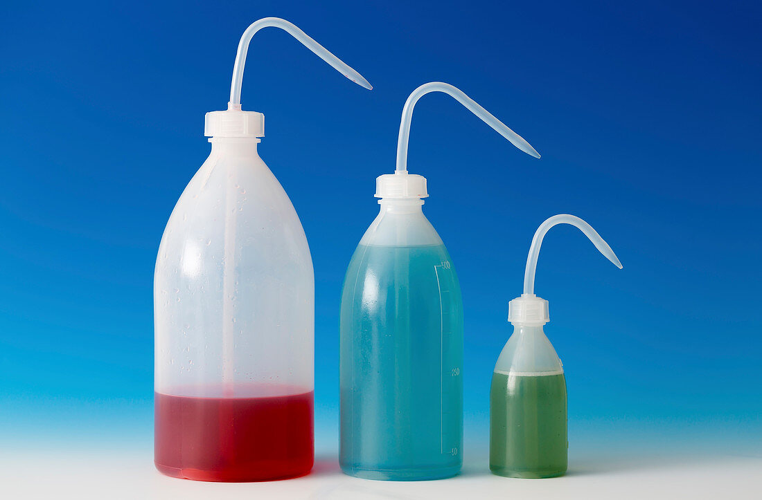 Colourful liquids in plastic bottles