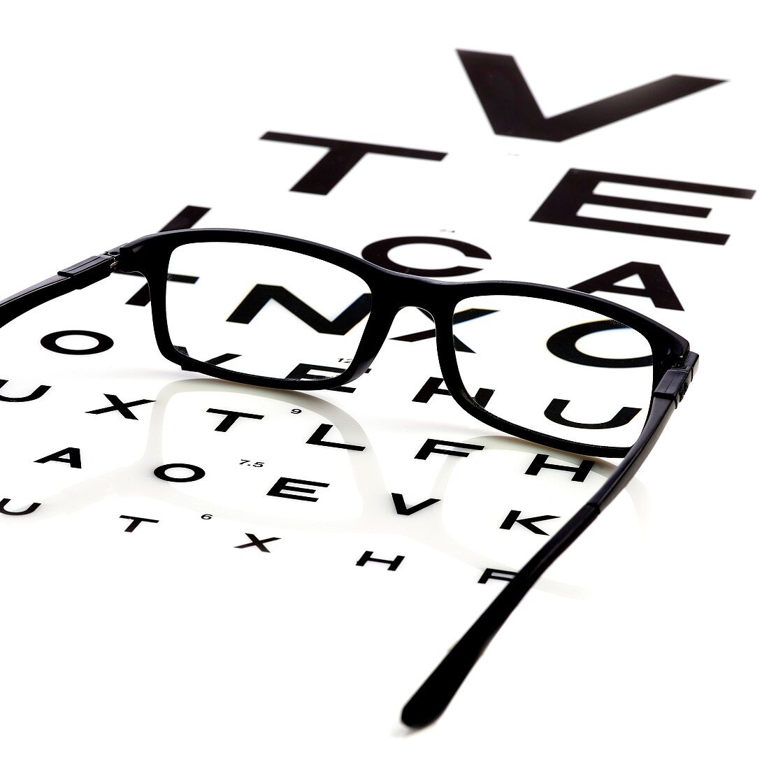 Opticians chart and a pair of glasses