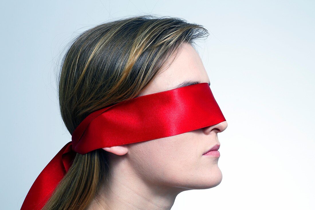 Woman wearing red blindfold