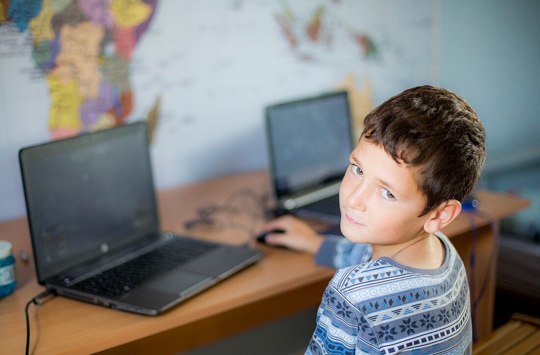 Boy using laptop