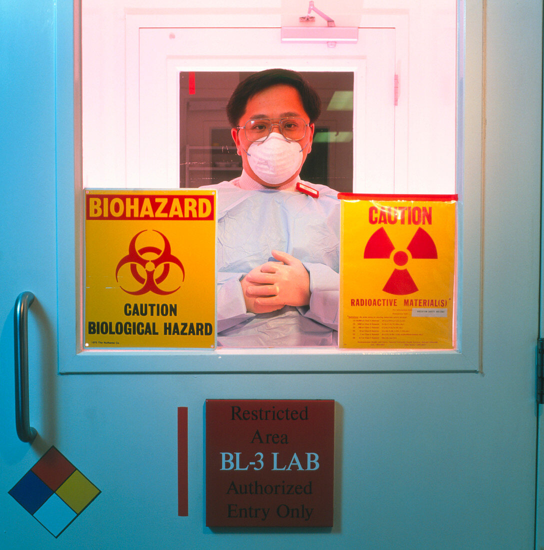 Researcher in a high-security virus laboratory