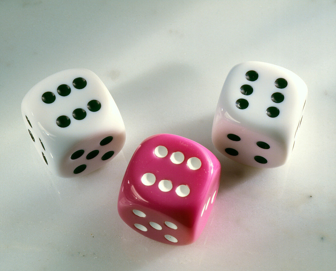 Three dice,each showing a six