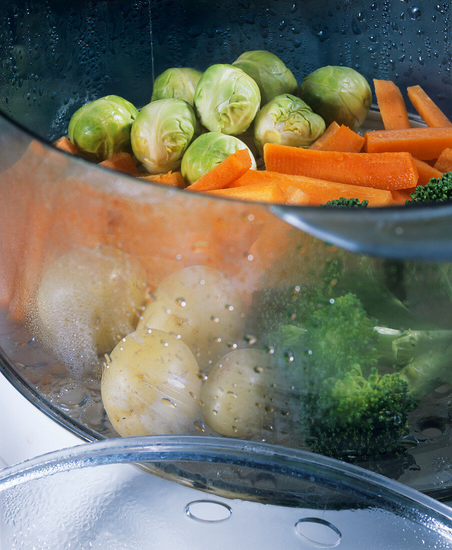 Vegetables being cooked in a steamer