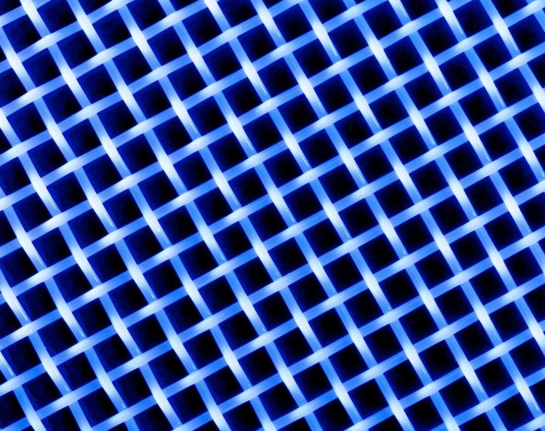Macrophoto of a lattice of polyester silk fibres