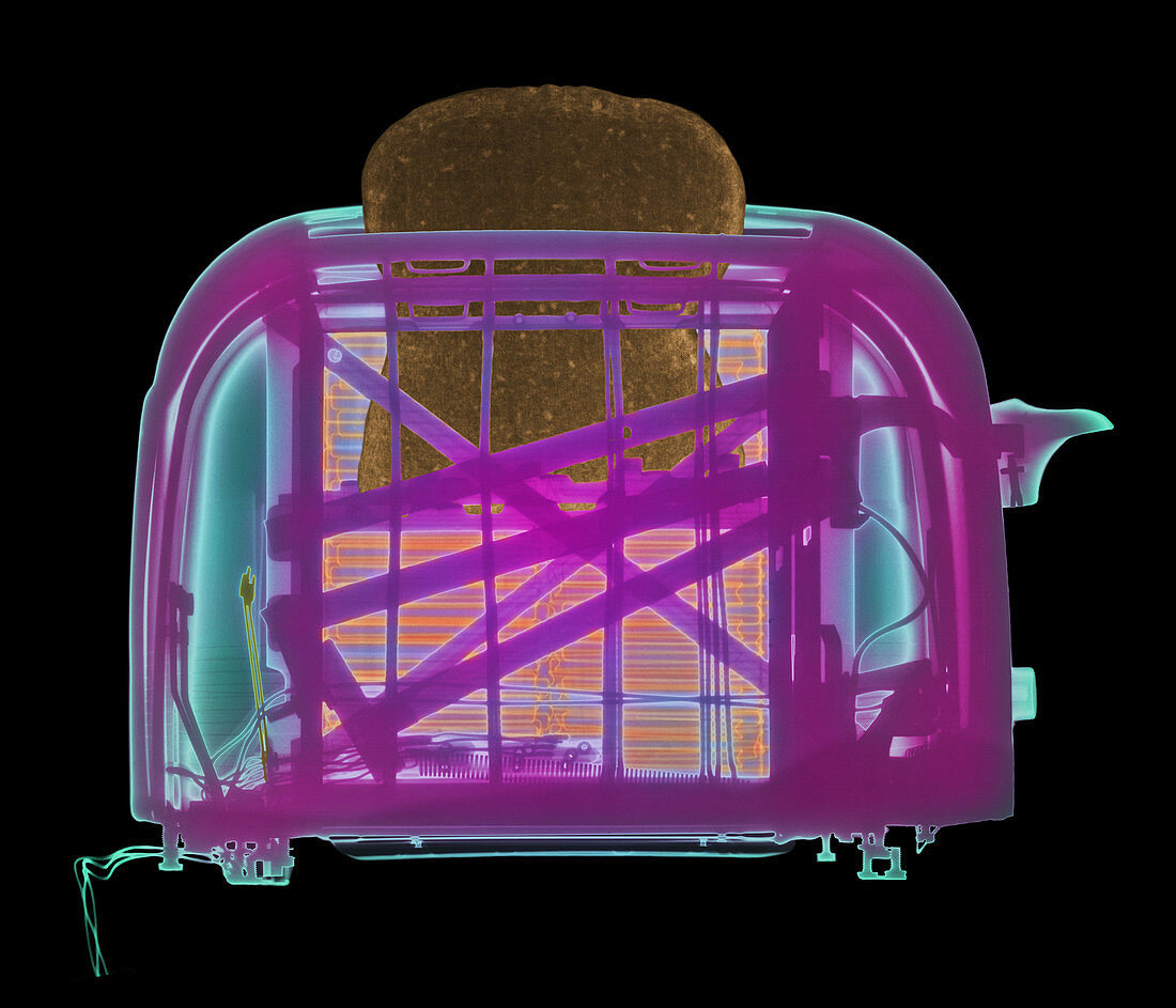 Coloured X-ray of a toaster with toast popping-up