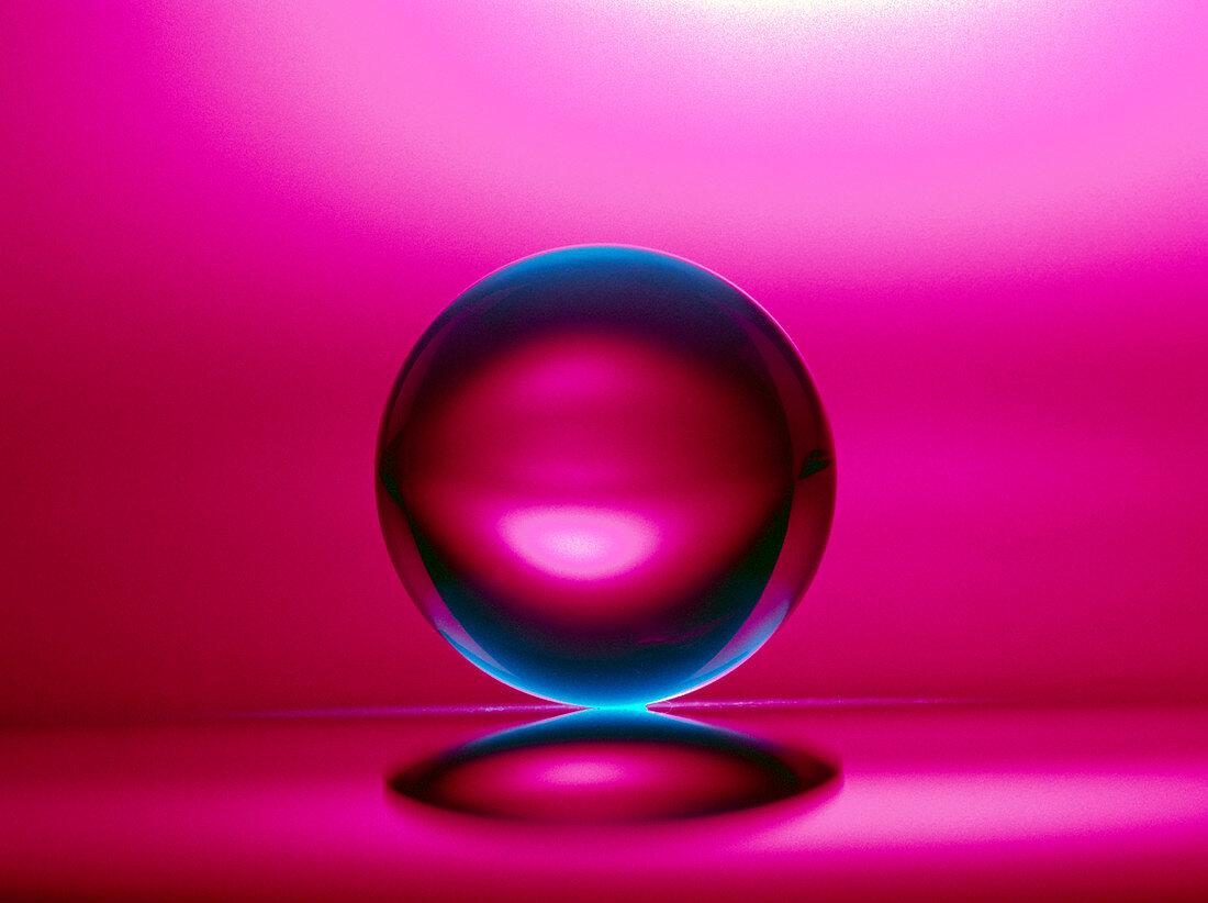 Glass sphere in red lighting