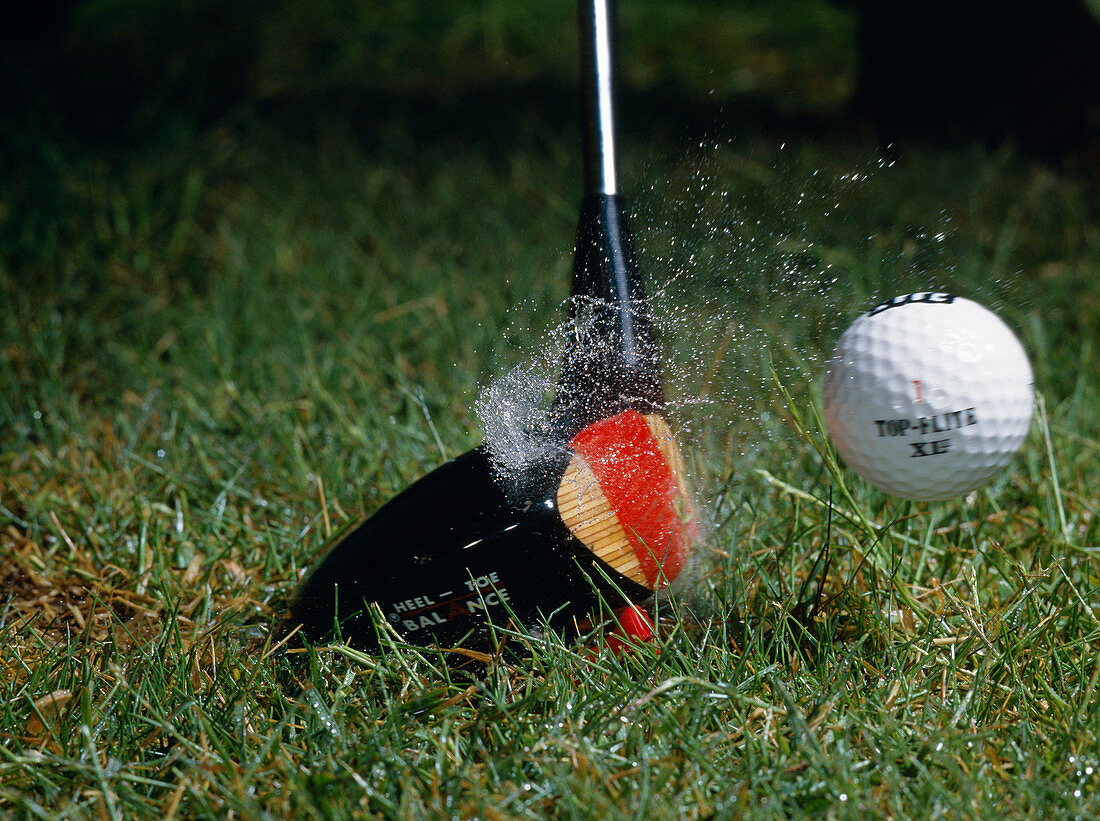 High speed photograph of a golf ball strike