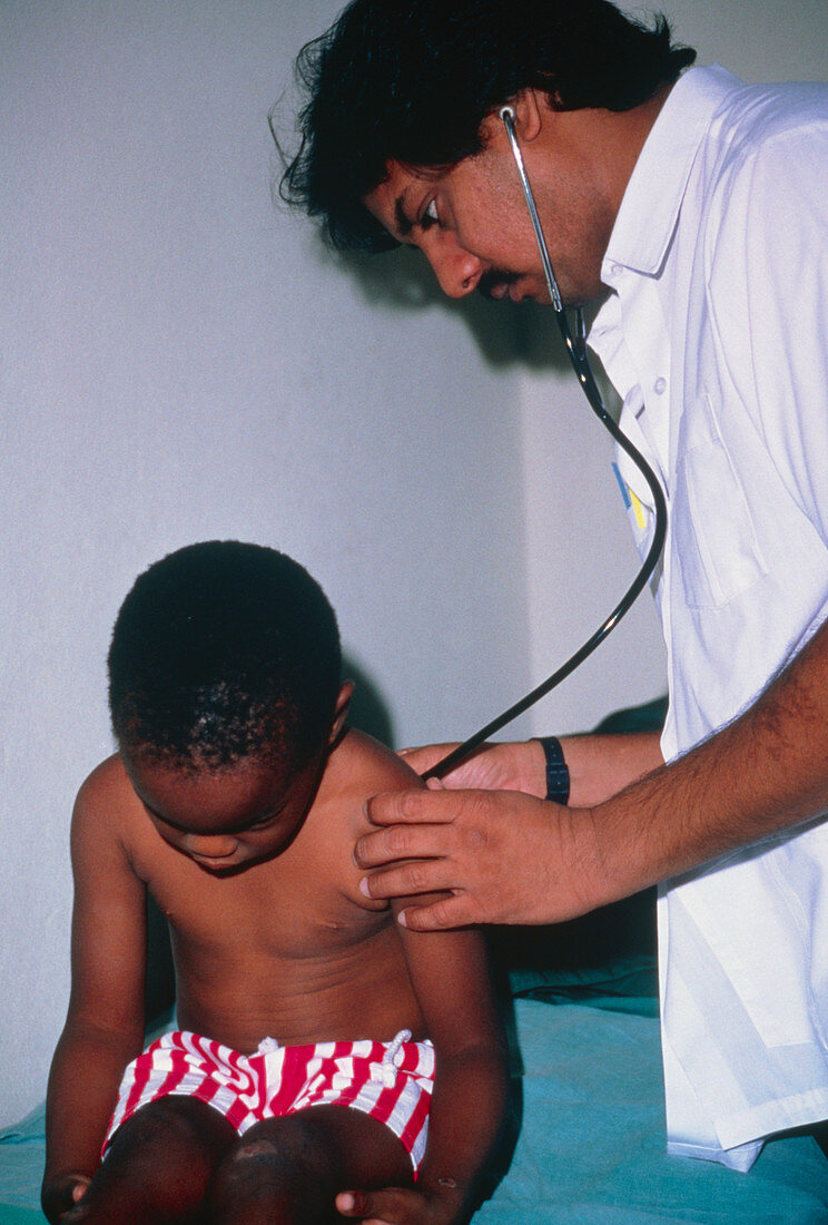 GP examining Jamaican boy with Sickle Cell Disease