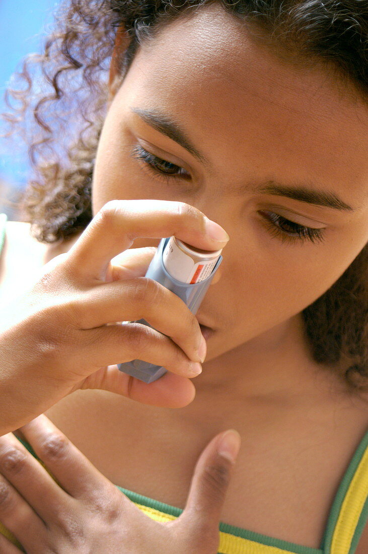 Using asthma inhaler