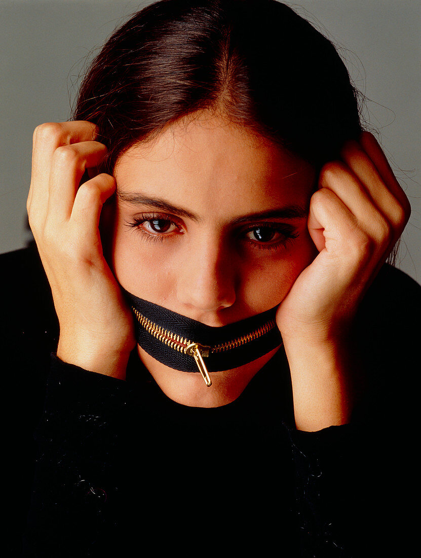 Anorexia nervosa: girl with zip around her mouth