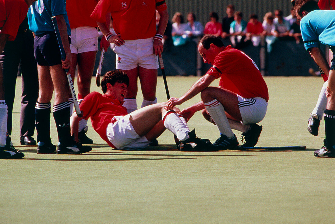 Hockey player injured on the field