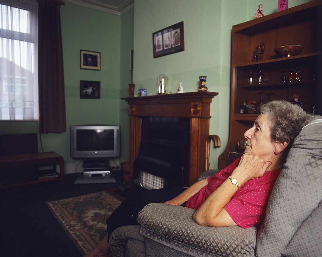 Elderly woman sitting