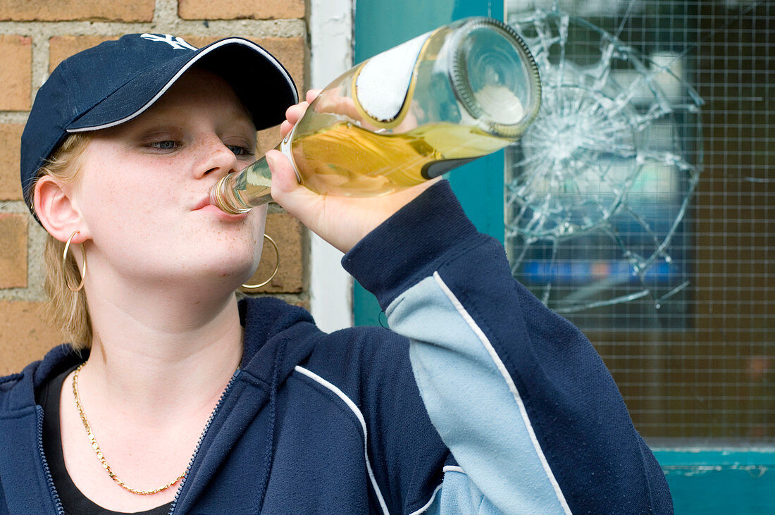 Teenage girl drinking alcohol
