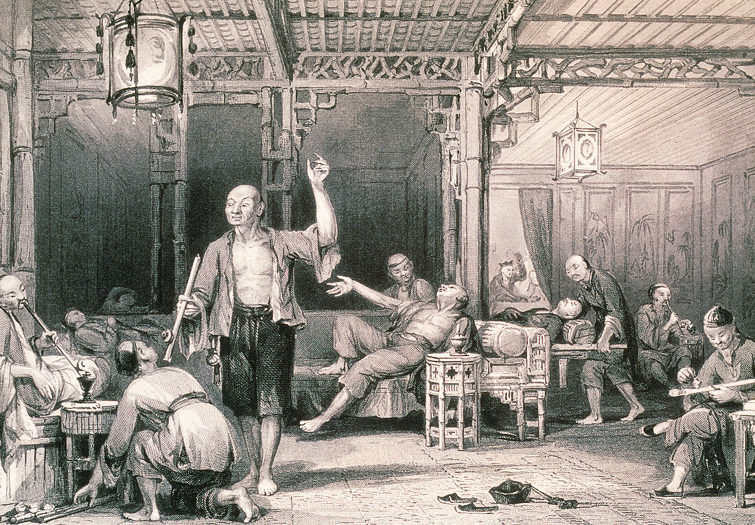 Opium smokers in an opium den