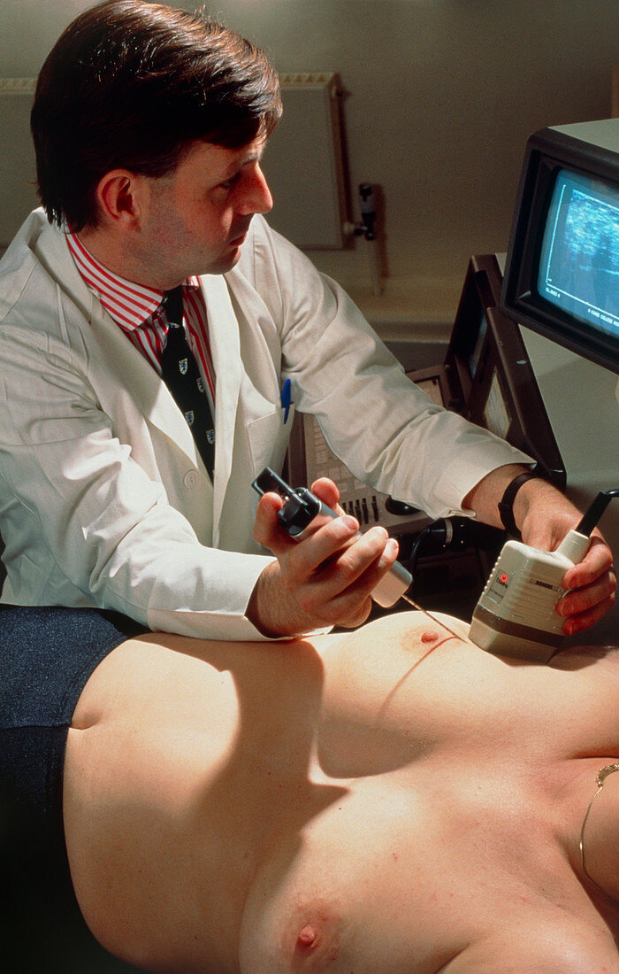 Ultrasound scanning of breast with biopsy sampling