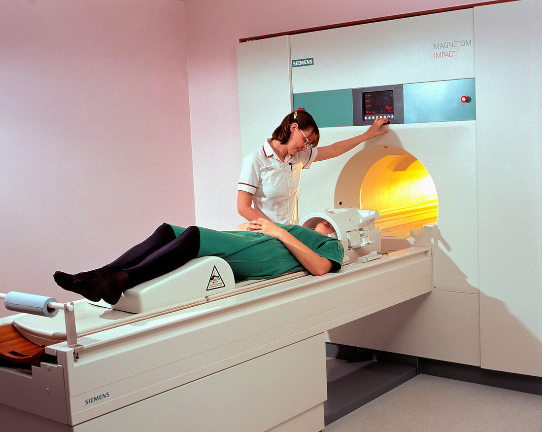 A patient is prepared for a MRI brain scan