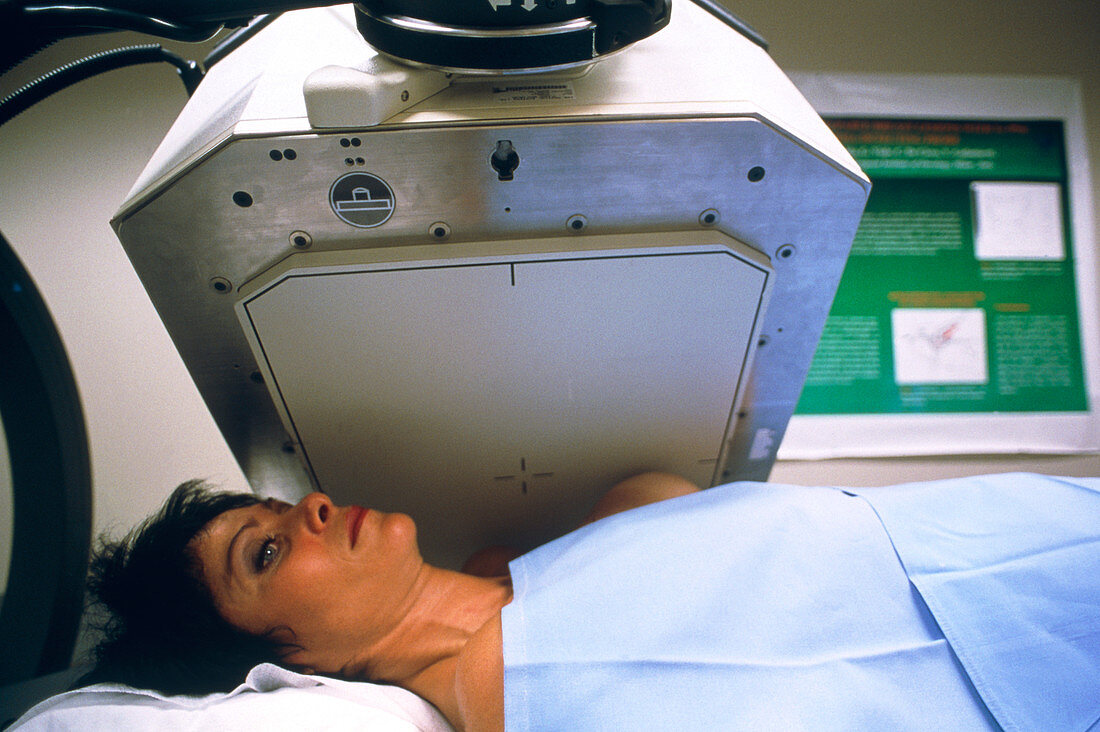 Woman undergoing gamma scanning of her breast