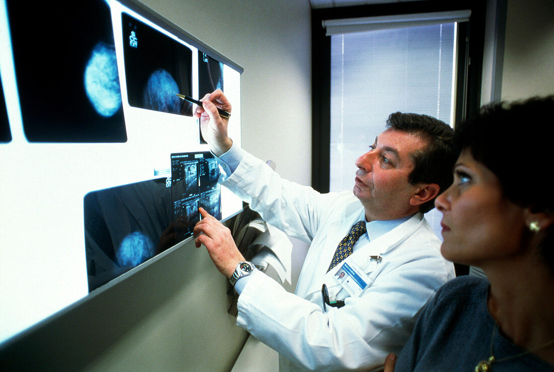 Doctor discussing a mammogram with female patient