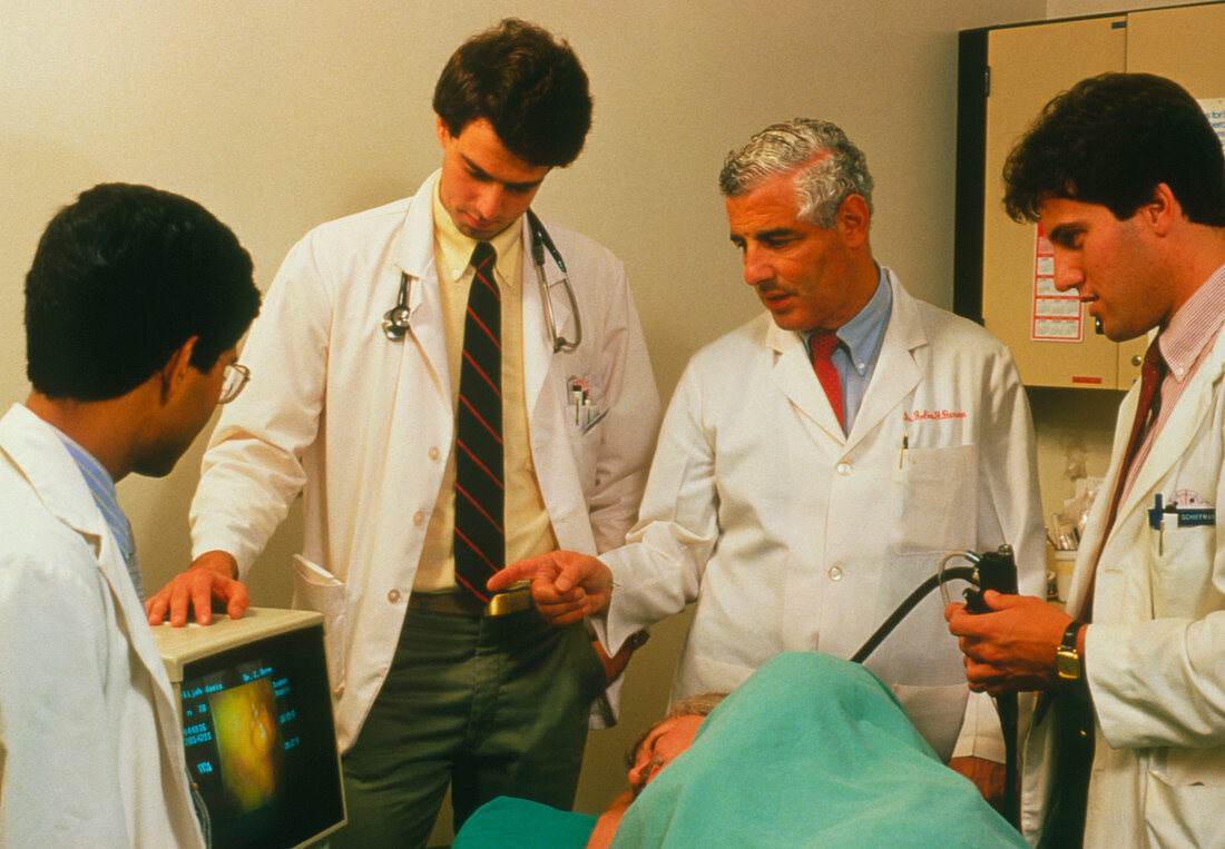 Doctors performing endoscope examination
