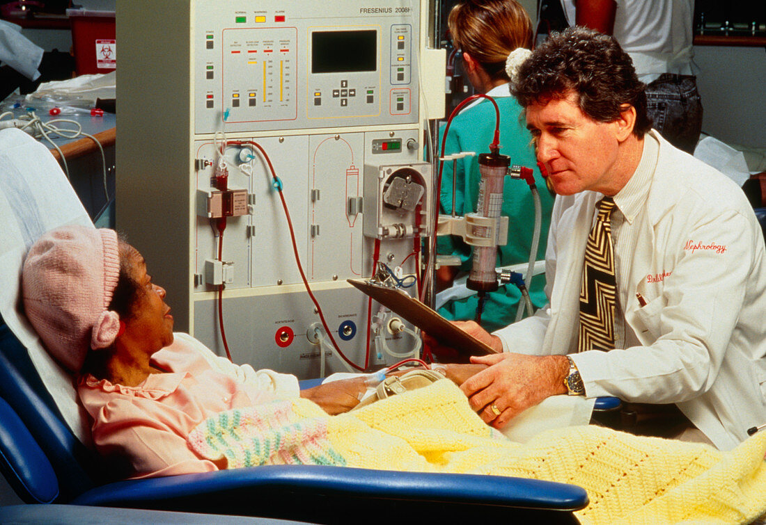 Patient at kidney machine with doctor attending