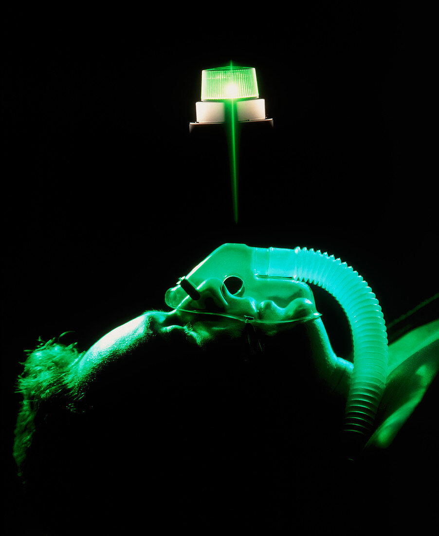 Green light illuminating patient's oxygen mask
