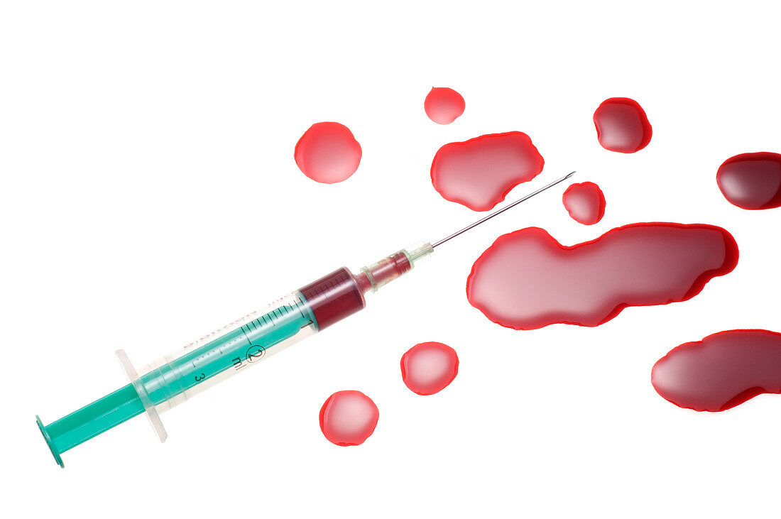 Hypodermic needle and spilt blood