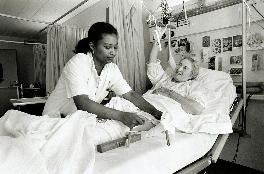 Hospital nurse and patient
