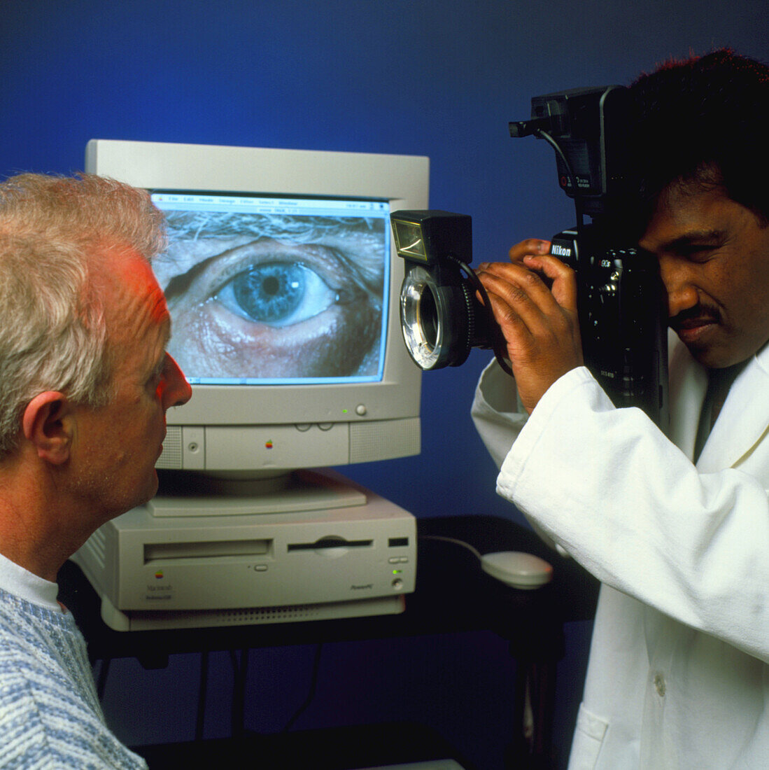 Doctor photographs man's eye for digital records