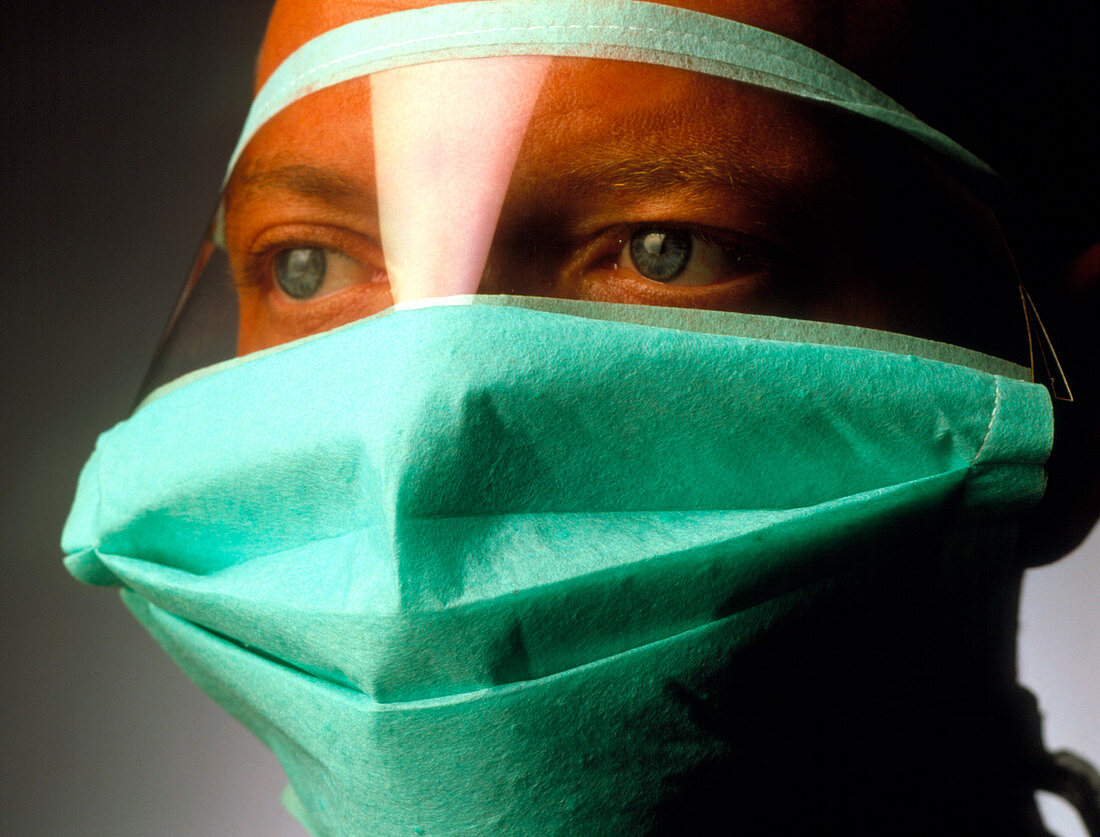 Masked face of a male surgeon