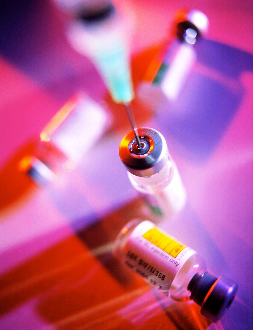 Hypodermic needle with vials of vaccine