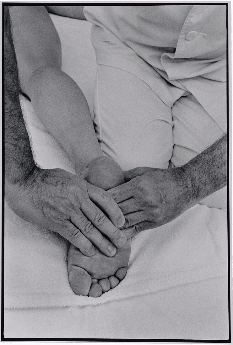 Foot of a woman receiving shiatsu massage