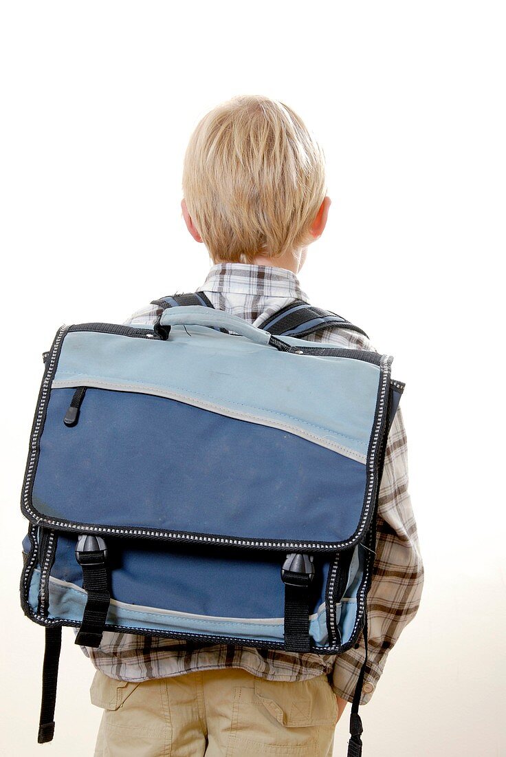 Boy carrying a satchel