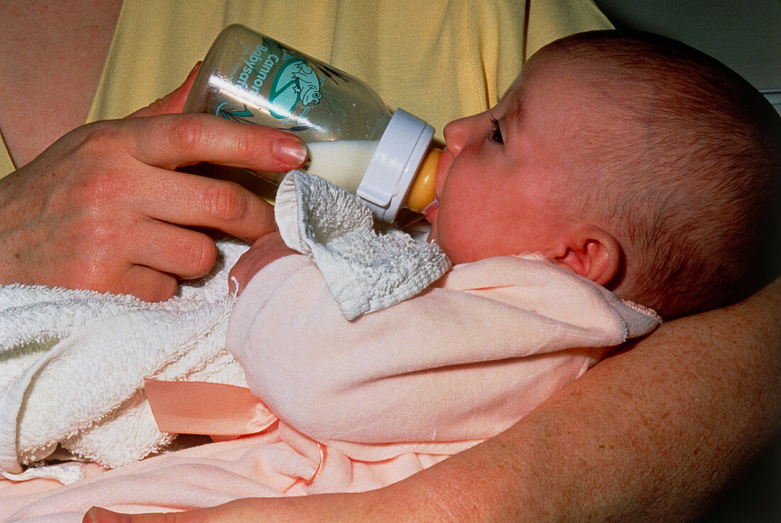 Bottle-feeding a young baby