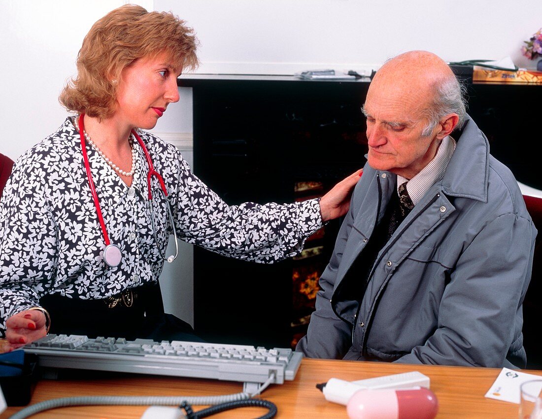 Doctor in consultation with depressed elderly man