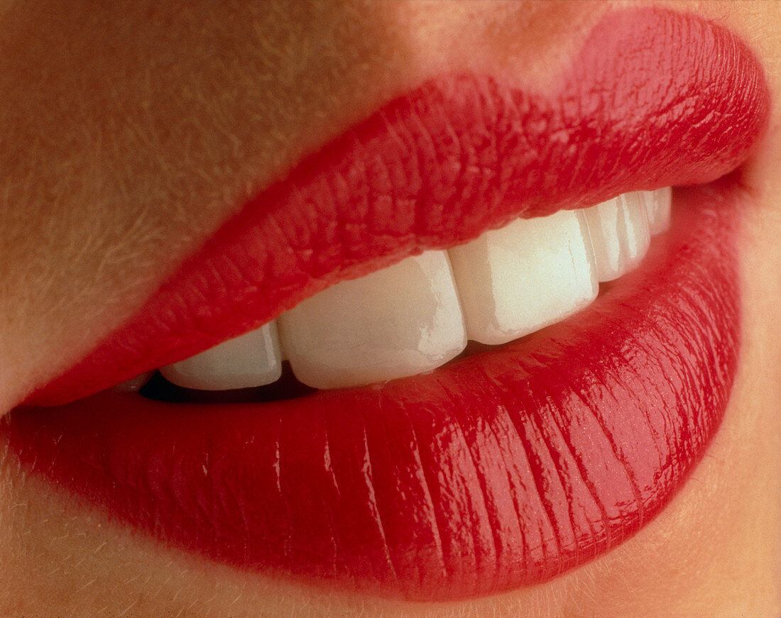 Close-up of a woman's mouth showing healthy teeth