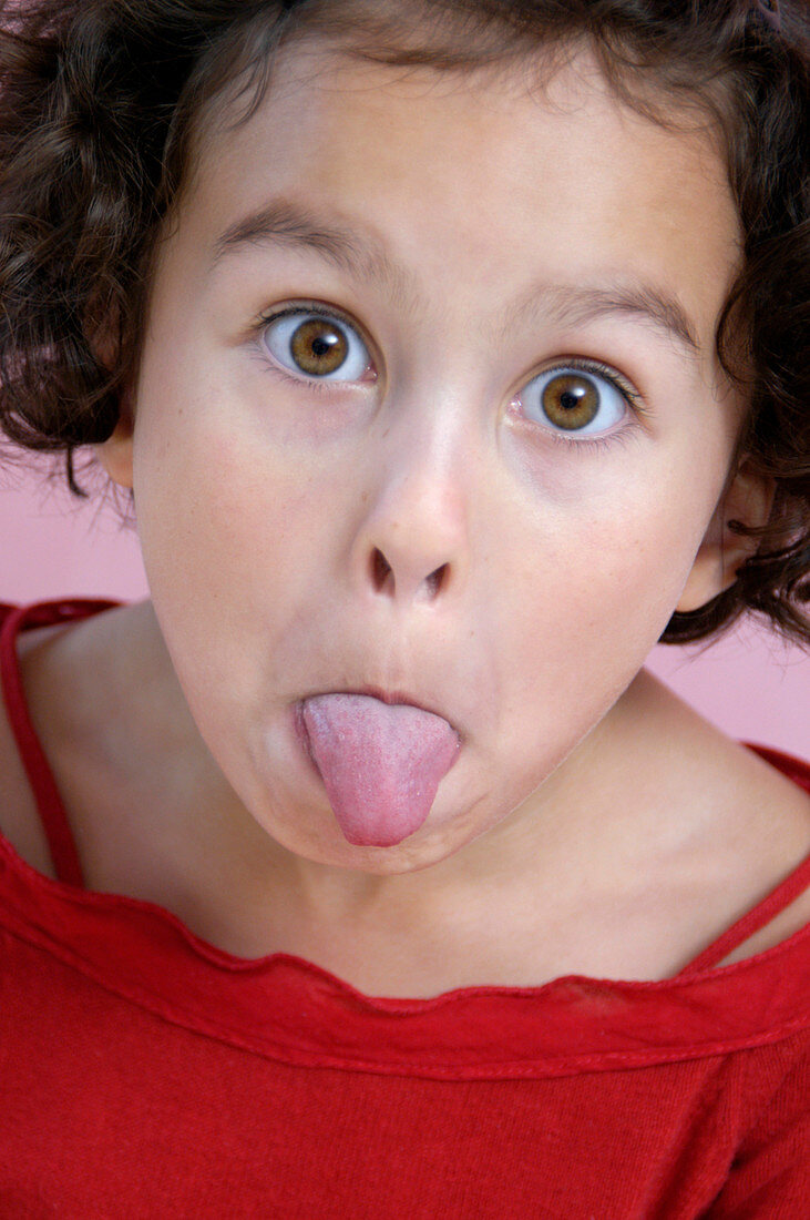 Girl sticking out her tongue