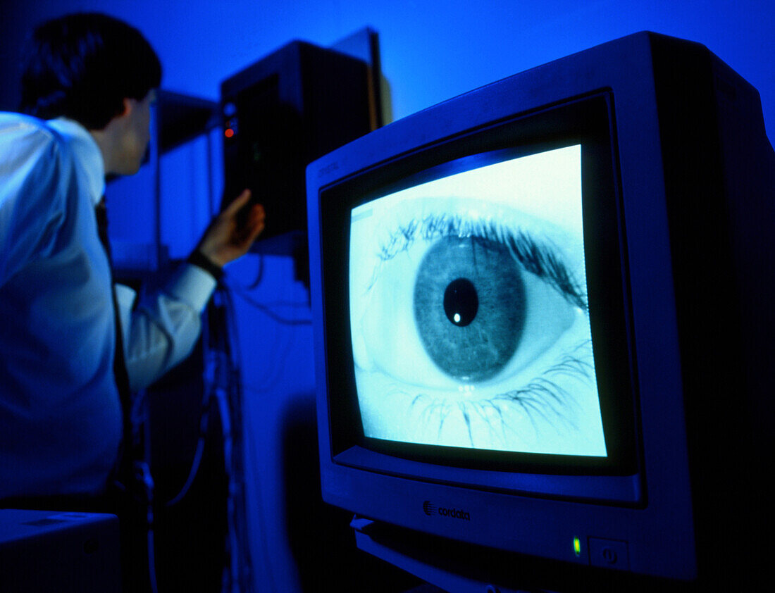 BT Laboratory researcher has his eye iris scanned