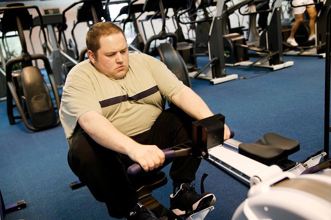 Obese man exercising