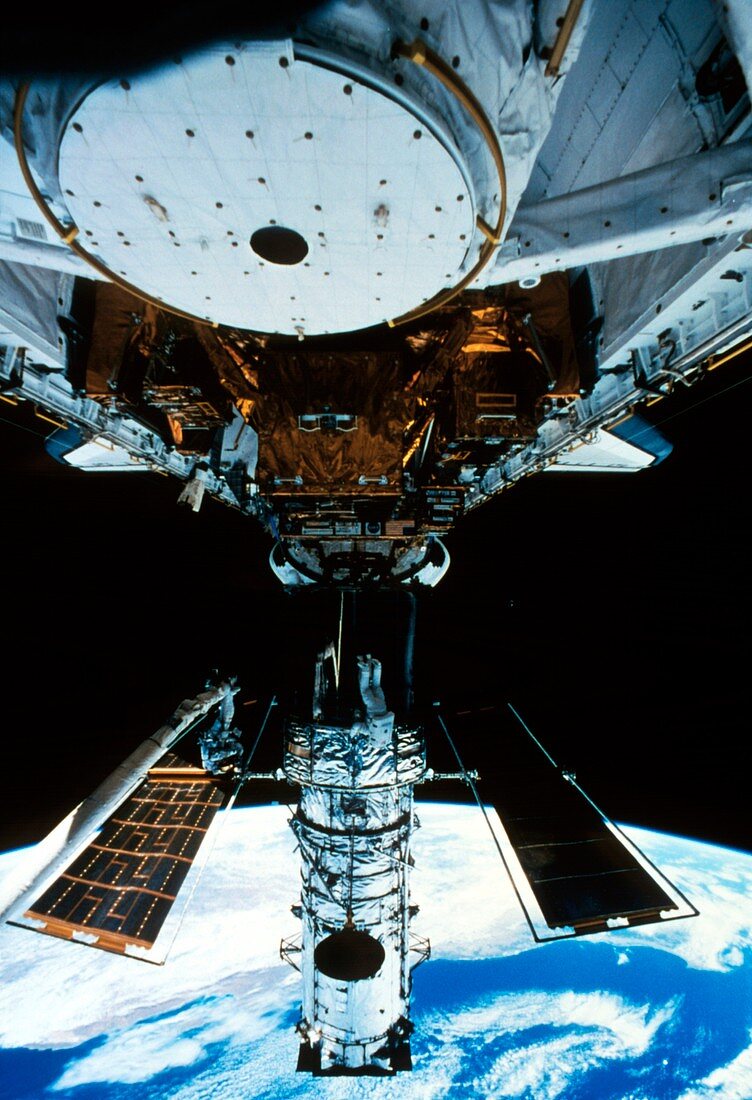 Astronauts spacewalk to repair Hubble telescope