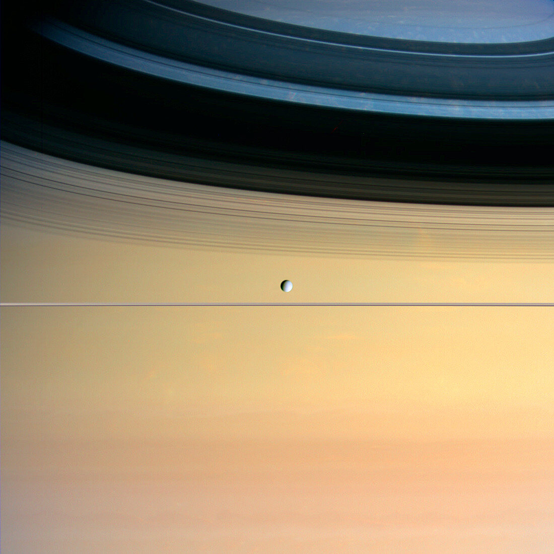 Dione and ring shadows on Saturn,Cassini