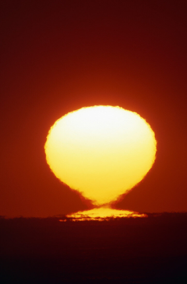 Image of a distorted Sun seen at sunset
