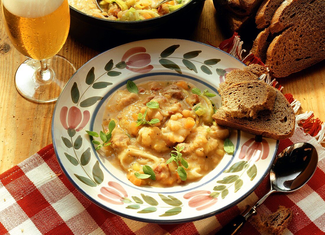 Hearty pea soup with diced bacon