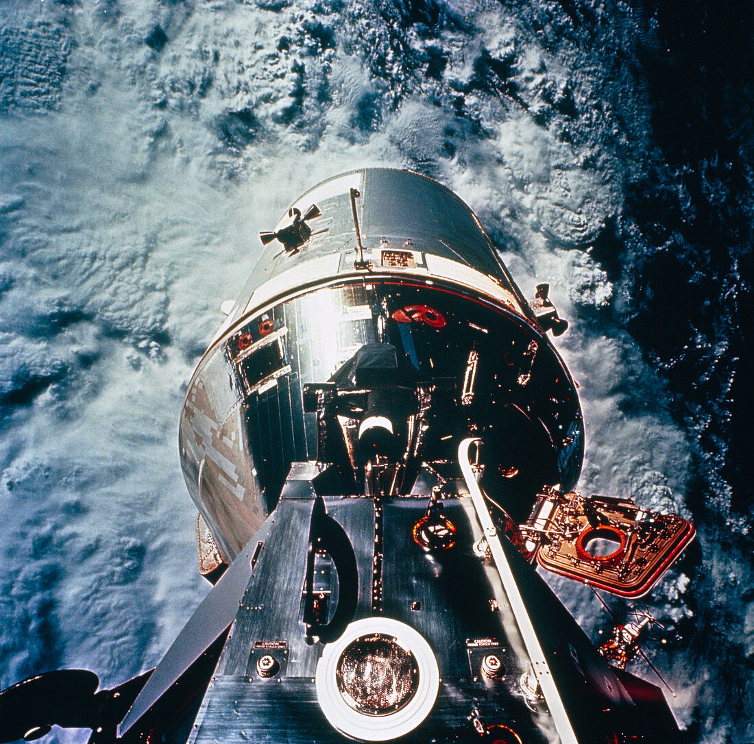 Apollo 9 modules orbiting above the Earth