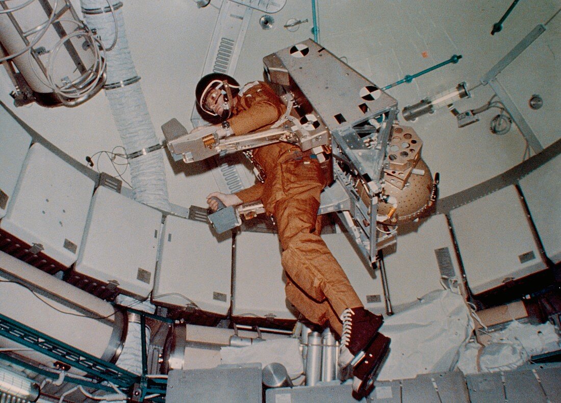 Skylab 3 astronaut Lousma conducting experiments