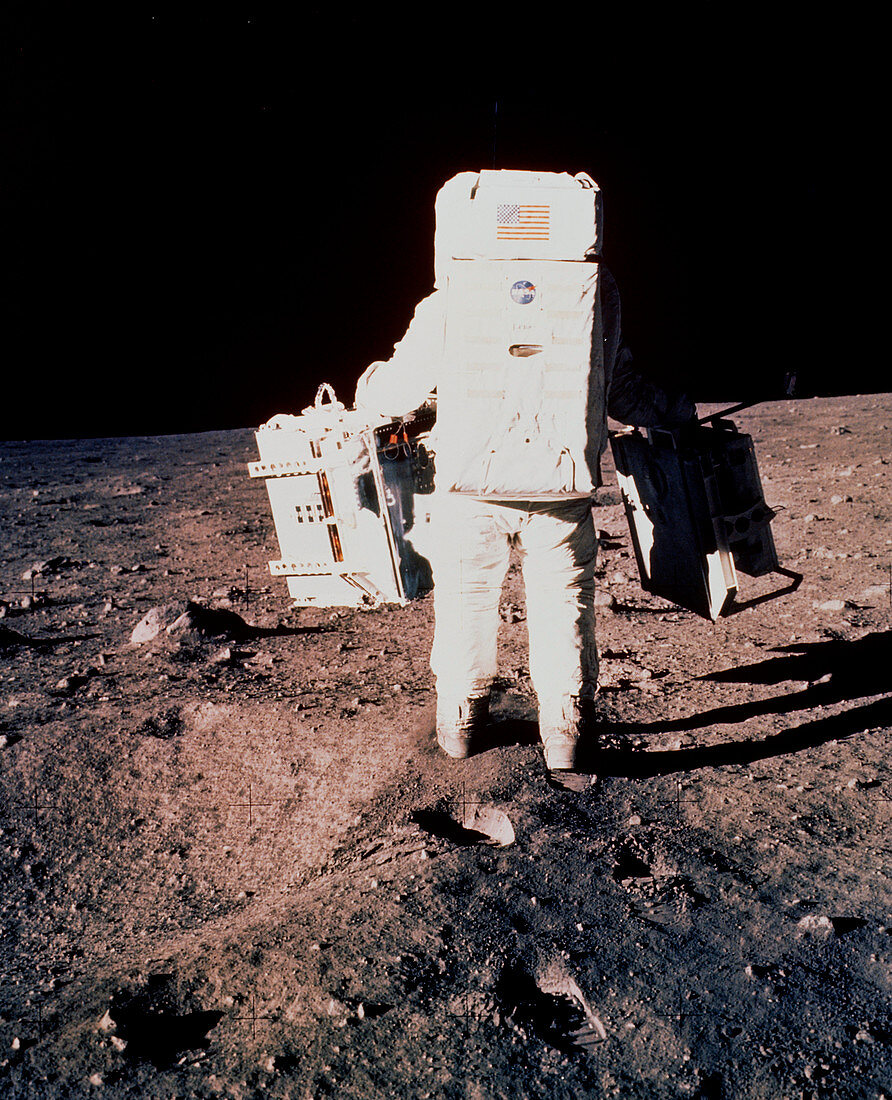 Apollo 11 astronaut Edwin Aldrin setting up EASEP