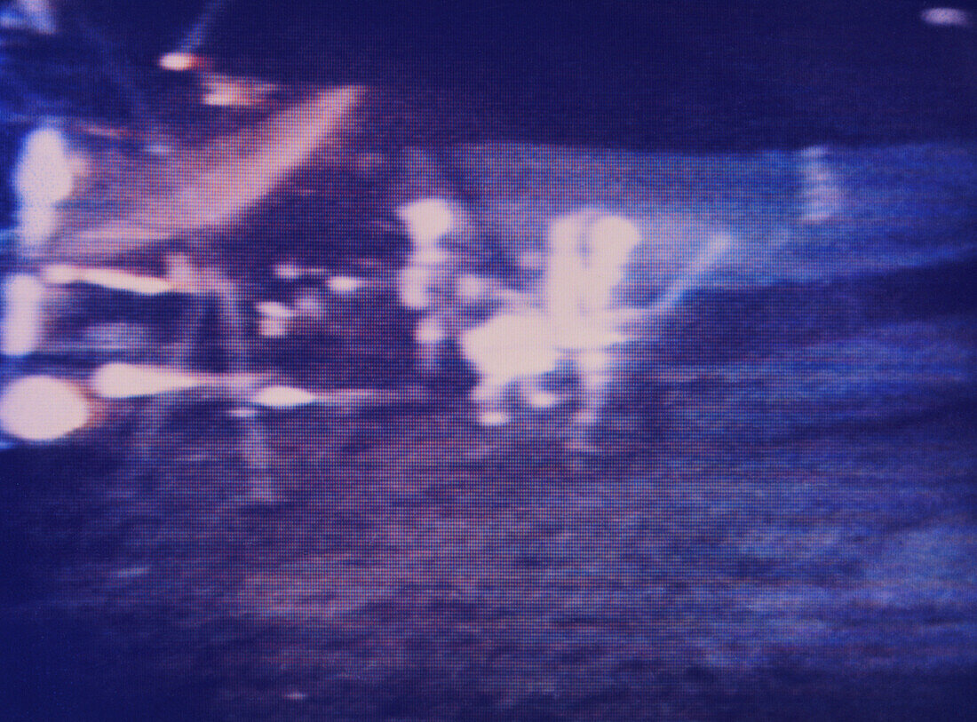 Alan Shephard playing golf on the moon