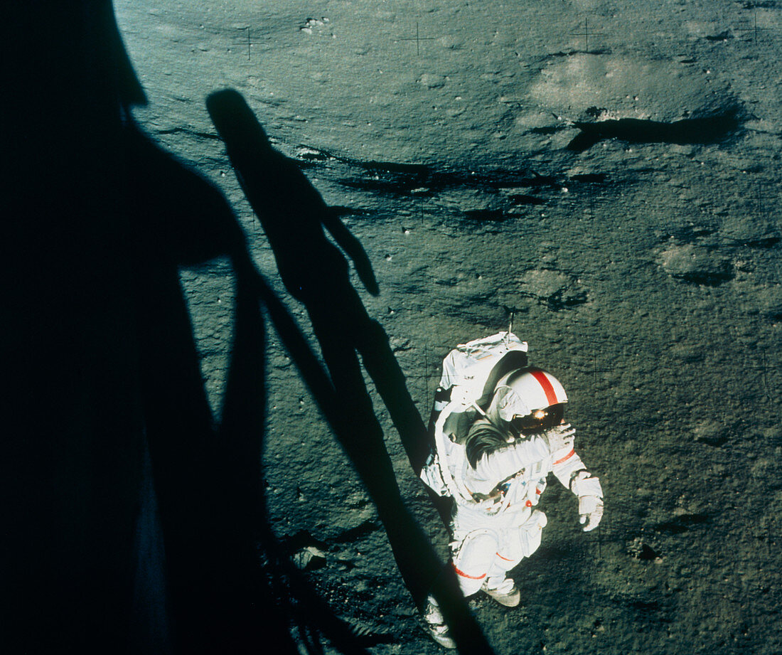 Astronaut Shepard next to Apollo 14 LM on Moon